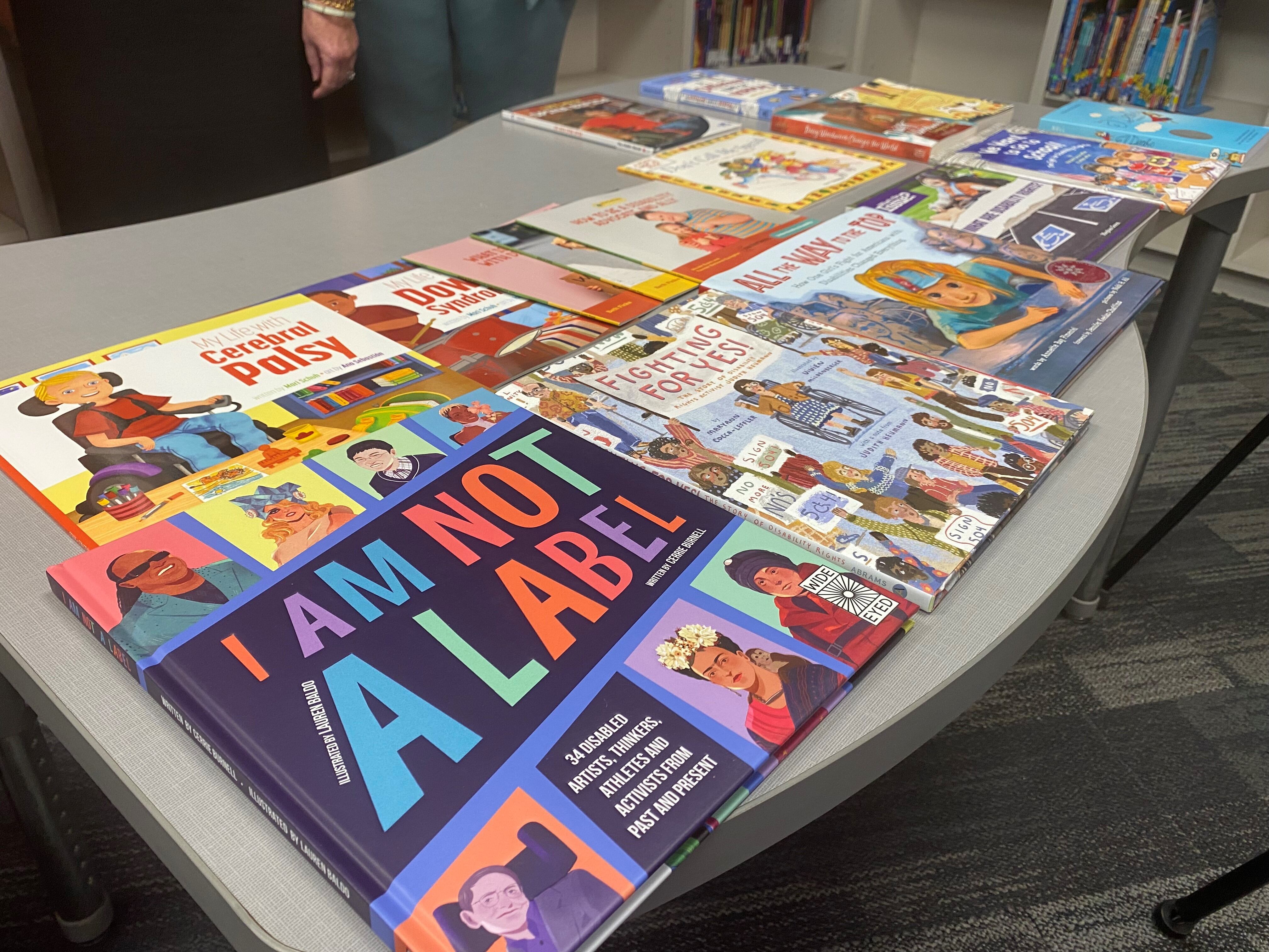 Book donation aims to teach acceptance of children with disabilities - Vimarsana News